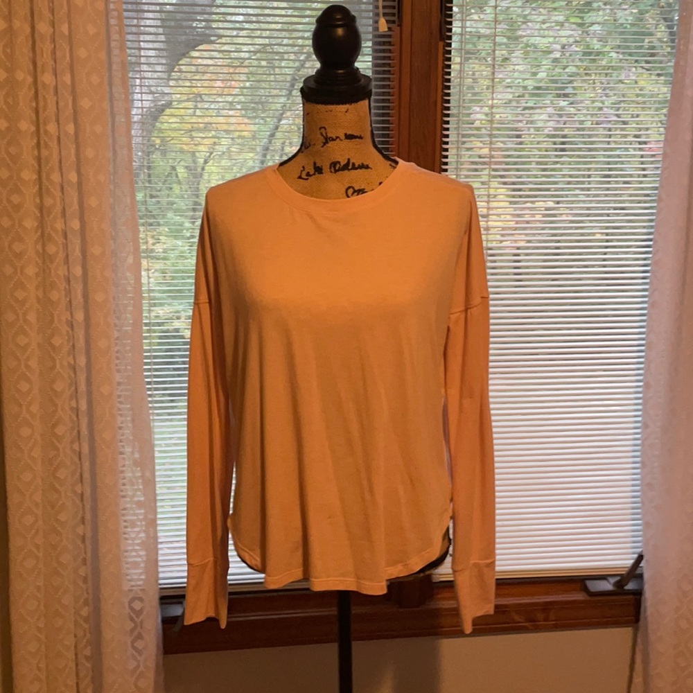 Light pink exercise shirt